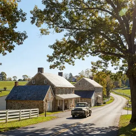 Charming village scene in Aldie, Virginia with stone buildings and rolling Loudoun County horse country