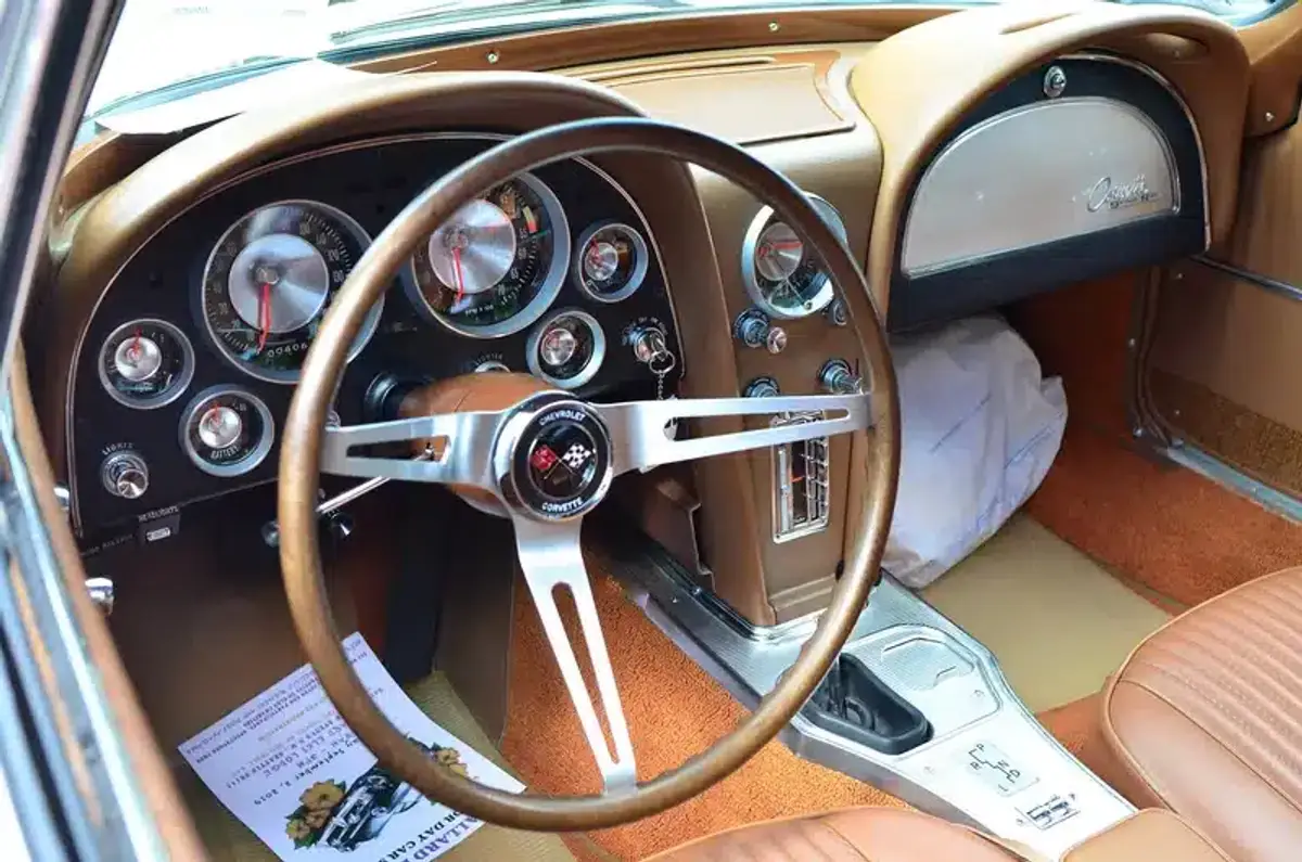 Car interior dashboard showing the enclosed space where ants can hide in crevices and vents