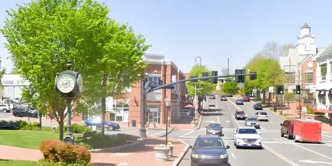 Tree-lined residential neighborhood in Fairfax, Virginia with mature landscaping