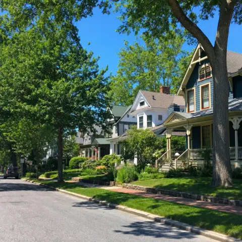 Historic Victorian and Craftsman homes on a tree-lined residential street in Kensington, Maryland