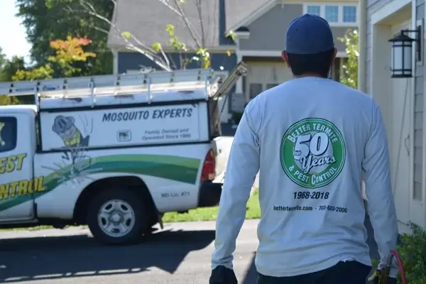 Technician walking towards truck